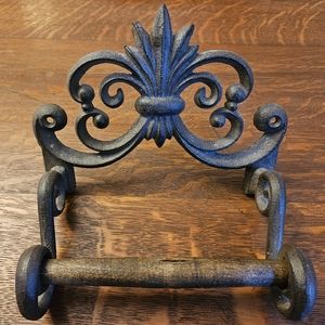 Iron ornate toilet paper holder